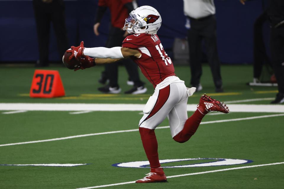 Arizona Cardinals wide receiver Christian Kirk (13) catches a long pass and runs it for a touchdown in the first half of an NFL football game against the Dallas Cowboys in Arlington, Texas, Monday, Oct. 19, 2020. (AP Photo/Ron Jenkins)