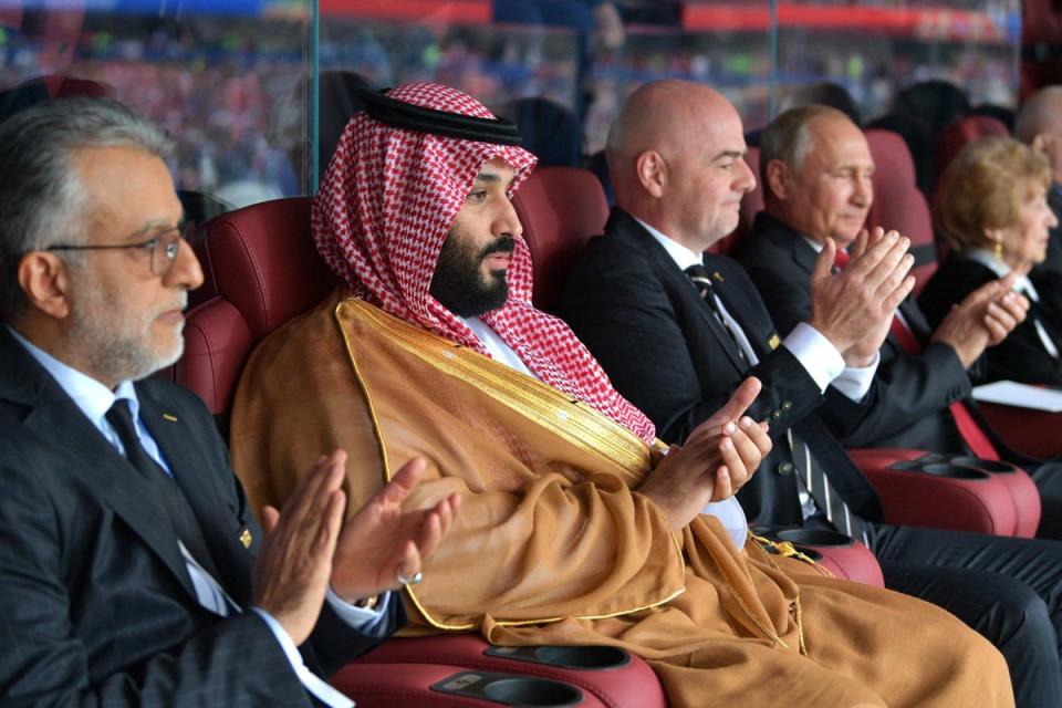 Saudi Arabia&#x002019;s Crown Prince Mohammed Bin Salman Al Saud with Fifa President Gianni Infantino, and Russia&#x002019;s President Vladimir Putin at a 2018 World Cup match (Getty Images)