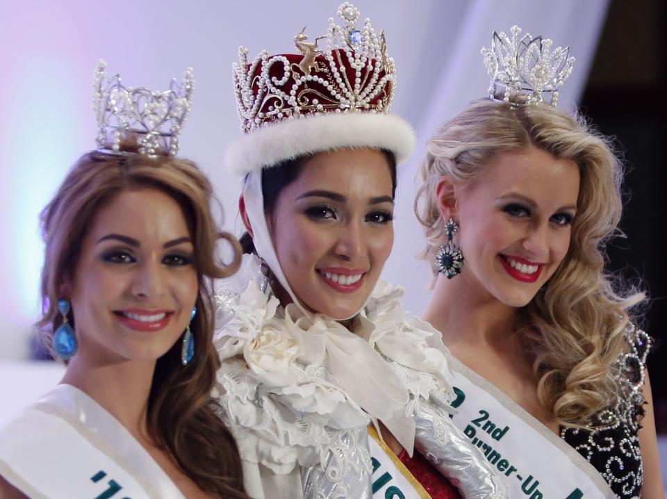 Newly crowned Miss International 2013 Santiago poses with runner-ups during the 53rd Miss International Beauty Pageant in Tokyo