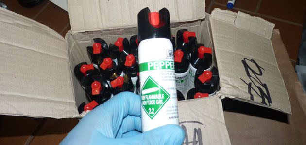 Some of the pepper spray allegedly found in the charged man's house. Photo: SAPOL