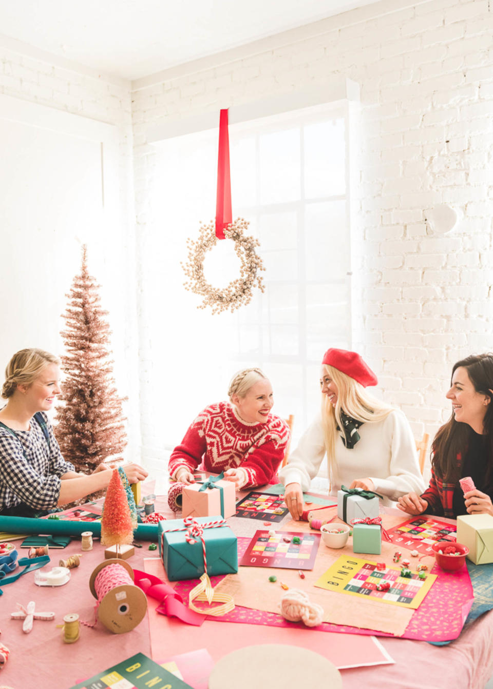 group of girls wrapping christmas gifts (Jane Merritt for The House That Lars Built )