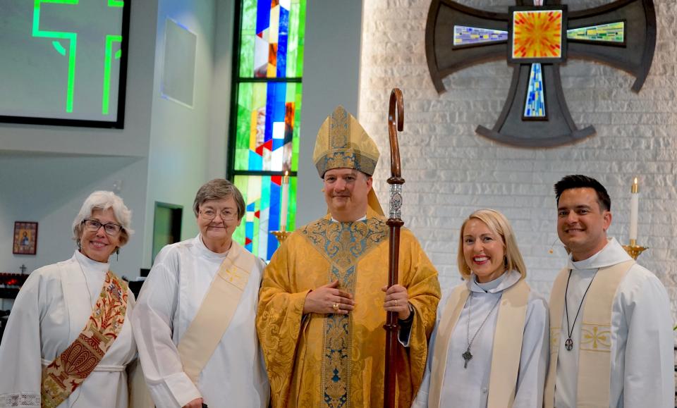 The Rev. Dana Orwig, Rev. Helen Waddle, Oklahoma Episcopal Bishop Poulson Reed, Rev. Kirsten Baer and Rev. Tim Baer, pose for a picture at the 2022 dedication of the new Grace Church building at 600 N Mustang Road. [Susanna LeMasters]
(Credit: Susanna LeMasters)