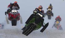 Men's Pro Open riders compete in the Canadian Snowcross Racing Association's (CSRA) Kawartha Cup in Lindsay, Ontario, in this February 8, 2014 file photo. REUTERS/Fred Thornhill/Files (CANADA - Tags: SPORT MOTORSPORT TPX IMAGES OF THE DAY)