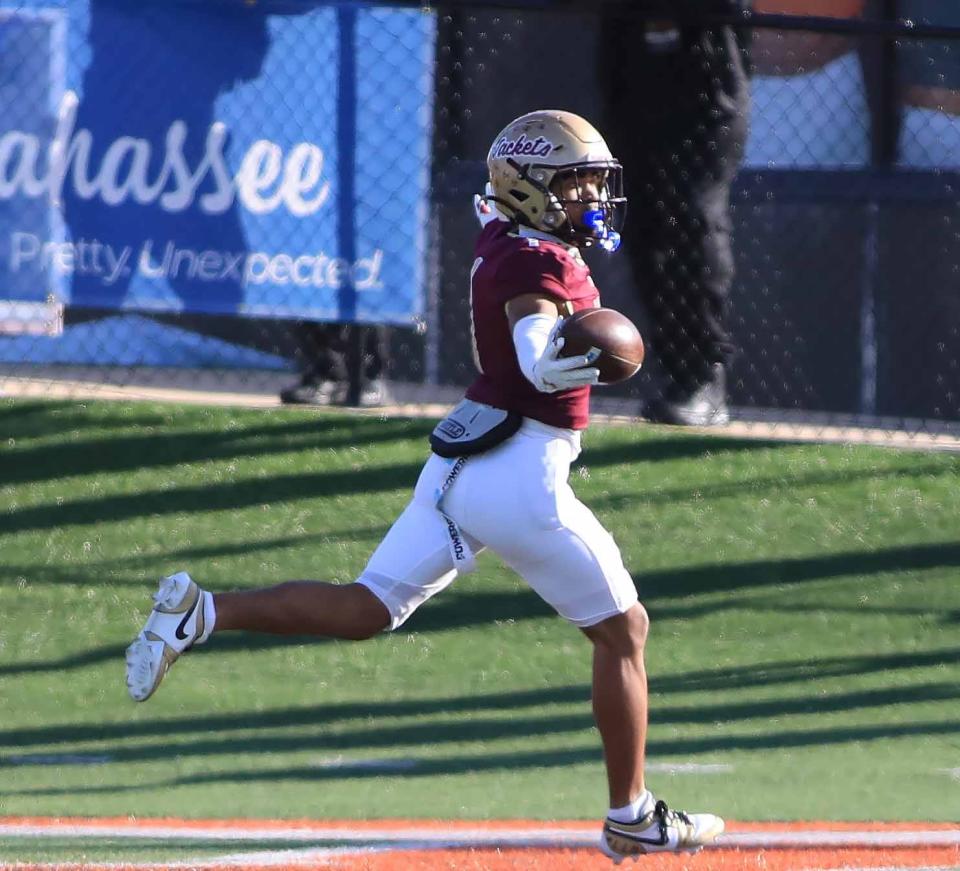 Trenton Jones returns the opening kickoff for a touchdown for St. Augustine against Daytona Beach Mainland.