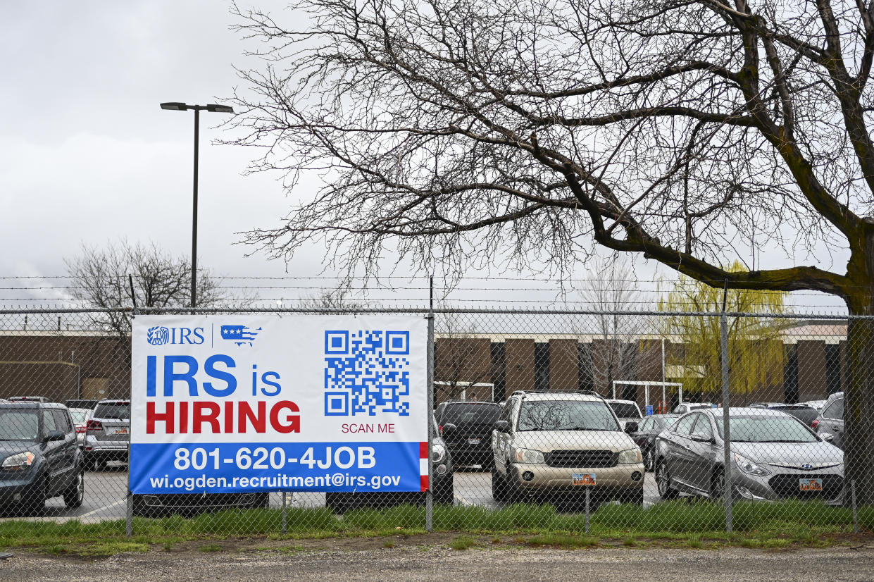 OGDEN, UTAH - MARCH 31: A sign seeking new new employees hangs outside at the Internal Revenue Service's facility on March 31, 2022 in Ogden, Utah. (Photo by Alex Goodlett for The Washington Post via Getty Images)