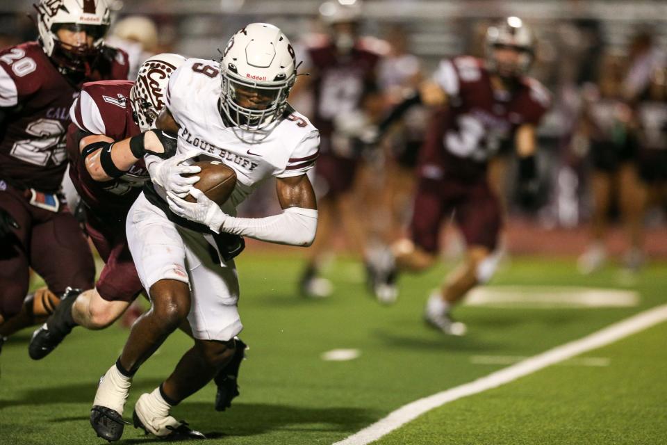 Flour Bluff's Cameran Dickson is tackled by Calallen's Elias Timbs during the game at Phil Danaher Stadium on Friday, Sept. 8, 2023, in Corpus Christi, Texas.