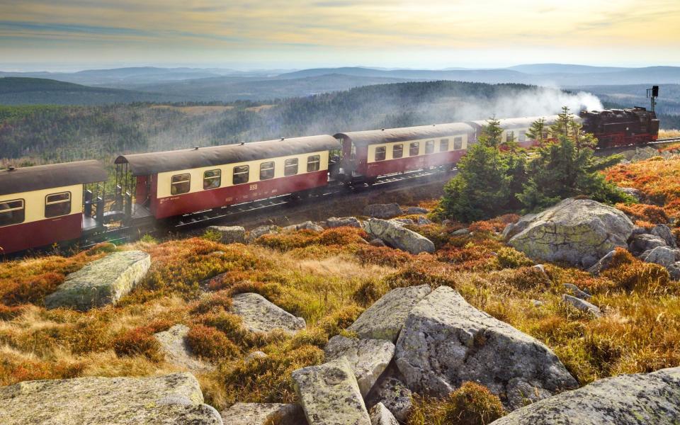 Train travelling through the hilly landscape of Harz National Park - Francesco Carovillano