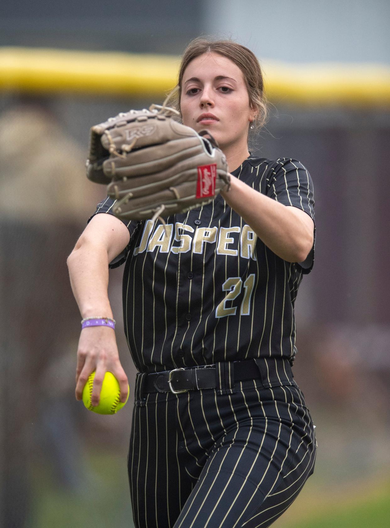 Jasper’s Elise Lampert (21) warms up as the Jasper Wildcats play the Memorial Tigers in Evansville, Ind., Tuesday, April 23, 2024.