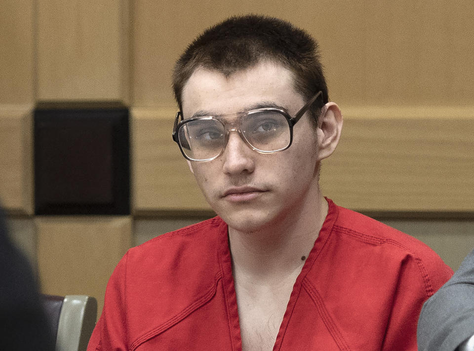 Florida school shooting defendant Nikolas Cruz appears in Judge Elizabeth Scherer's courtroom at the Broward Courthouse, Thursday, Dec. 19, 2019, in Fort Lauderdale, Fla. The trial of Parkland school shooting defendant Nikolas Cruz was delayed Thursday until at least next summer, when he will face a death penalty case stemming from the February 2018 massacre that left 17 people dead. (Michael Laughlin/South Florida Sun-Sentinel via AP, Pool)