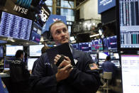 Trader Jonathan Corpina works on the floor of the New York Stock Exchange, Wednesday, June 19, 2019. Investors are in wait-and-see mode hours ahead of a widely anticipated Federal Reserve decision on interest rates. (AP Photo/Richard Drew)