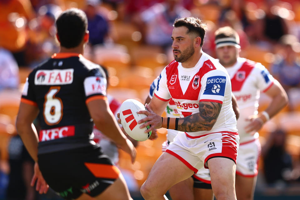 BRISBANE, AUSTRALIA - MAY 07:  Jack Bird of the Dragons runs the ball during the round 10 NRL match between Wests Tigers and St George Illawarra Dragons at Suncorp Stadium on May 07, 2023 in Brisbane, Australia. (Photo by Chris Hyde/Getty Images)