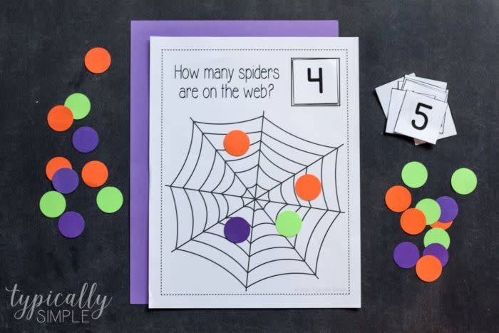 <p>Kids can pick a number card, place it in the square and then count out how many "spiders" are needed to match the number. A great activity to help them with math! </p><p><a href="https://typicallysimple.com/counting-spiders/" rel="nofollow noopener" target="_blank" data-ylk="slk:Get the printable at Typically Simple »;elm:context_link;itc:0;sec:content-canvas" class="link "><em>Get the printable at Typically Simple »</em> </a></p>