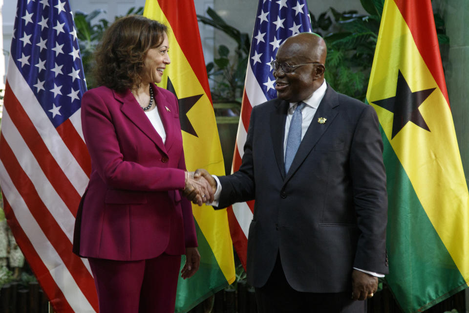 U.S. Vice President Kamala Harris is welcomed by Ghana President Nana Akufo-Addo in Accra, Ghana, Monday March 27, 2023. Harris is on a seven-day African visit that will also take her to Tanzania and Zambia. (AP Photo/Misper Apawu)