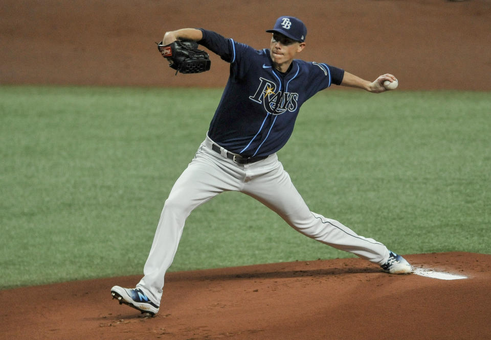 Tampa Bay Rays starter Ryan Yarbrough pitches against the Texas Rangers during the first inning of a baseball game Tuesday, April 13, 2021, in St. Petersburg, Fla. (AP Photo/Steve Nesius)