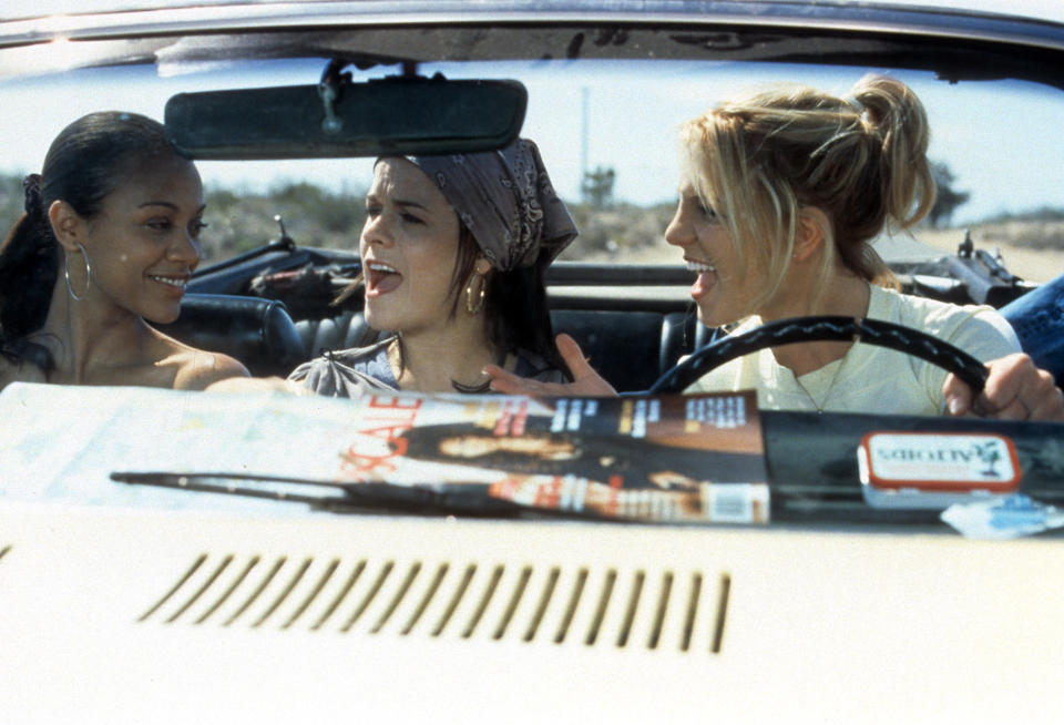 Zoe Saldana, Taryn Manning, and Britney Spears riding in car in a scene from the film Crossroads