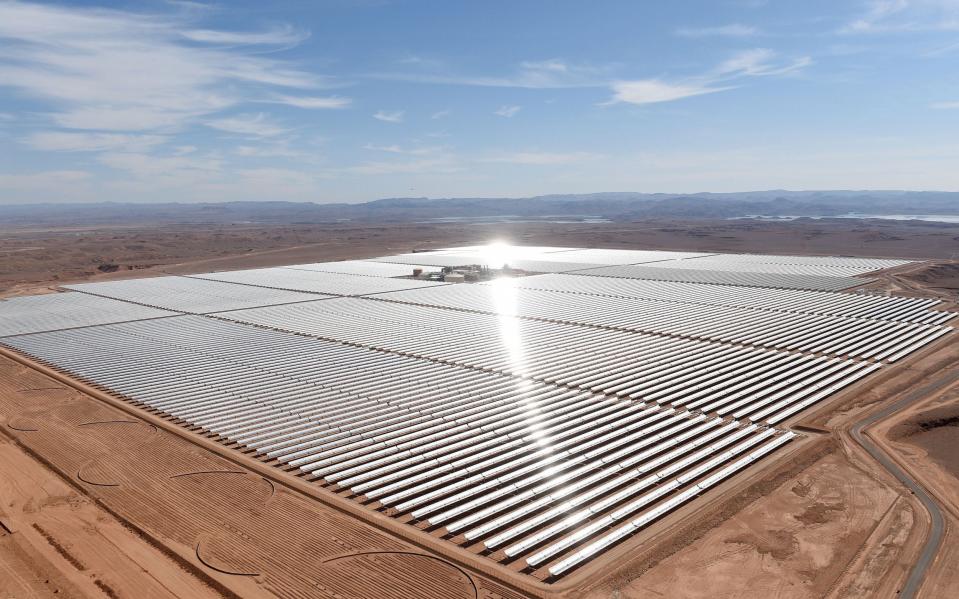 A picture taken on February 4, 2016 shows an aerial view of the solar mirrors at the Noor 1 Concentrated Solar Power (CSP) plant, some 20km (12.5 miles) outside the central Moroccan town of Ouarzazate, ahead of its inauguration. / AFP PHOTO / FADEL SENNA (Photo credit should read FADEL SENNA/AFP via Getty Images) - FADEL SENNA/AFP