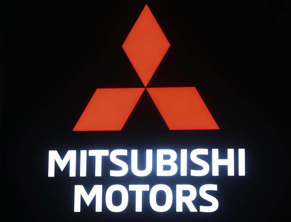 In this Oct. 25, 2017, photo, Mitsubishi Motor Co. logo is displayed at the Tokyo Auto show in Tokyo. German-U.S. automaker Daimler Chrysler bought a 37 percent stake in Tokyo-based Mitsubishi Motors Corp. in 2000, but the alliance felt rocky from the start. Mitsubishi Motors was embroiled in a years-long scandal over its systematic cover-up of auto defects. (AP Photo/Koji Sasahara)