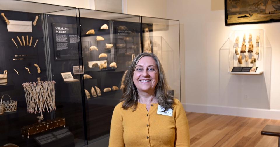 Museum executive director Sarah Johnson worked with guest curator Alan Granby for months to pull together the 250-piece scrimshaw exhibit now on display at the Cahoon Museum of American Art in Cotuit.
