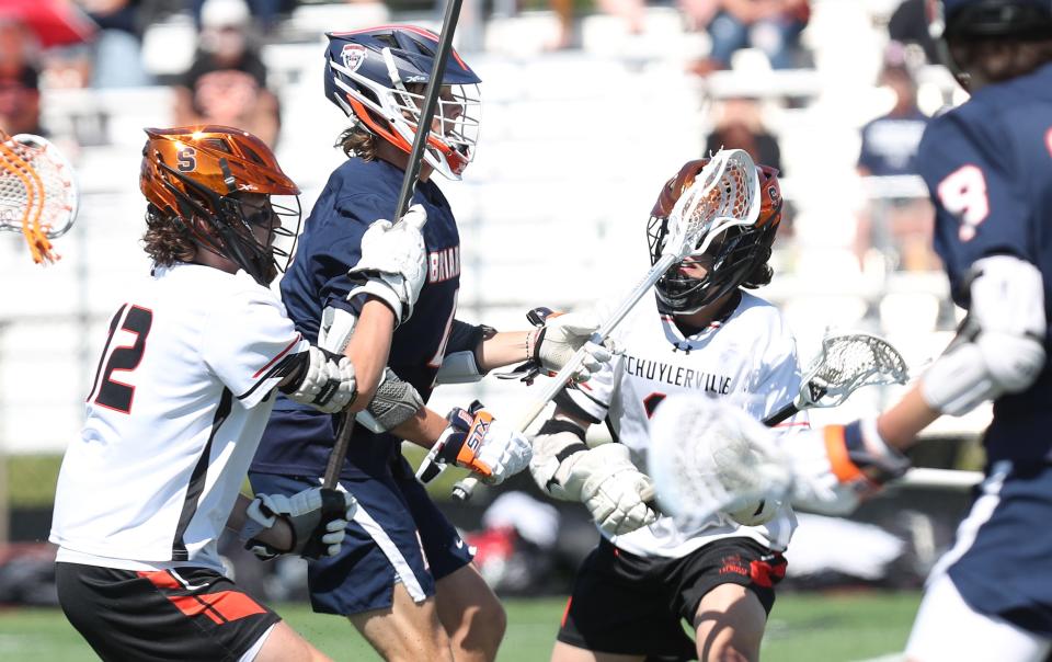 Briarcliff's Jackson Ricciardi (4) fires a shot for a first half goal against Schuylerville during the boys lacrosse Class D regional final at Shaker High School in Albany June 4, 2022.  Briarcliff won the game 14-2.