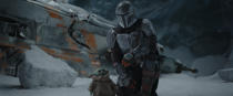 The Mandalorian (Pedro Pascal) and the Child in THE MANDALORIAN, season two. Â© 2020 Lucasfilm Ltd. & TM. All Rights Reserved.