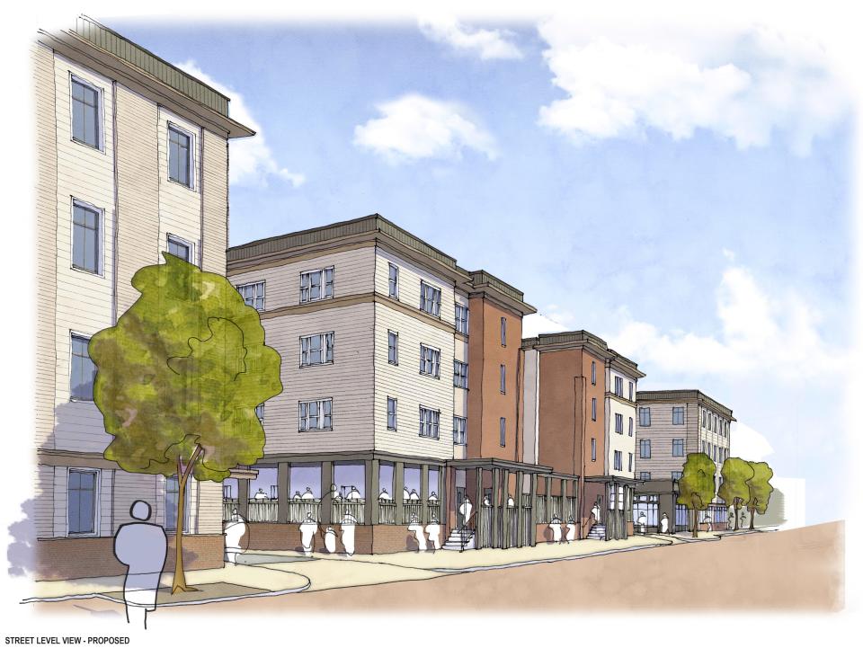 This rendering shows the outside of a proposed 160-unit, 3-building development in East Providence.