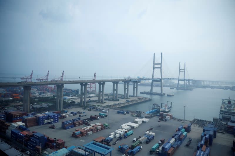 FILE PHOTO: Cranes and shipping containers are seen at Pyeongtaek port in Pyeongtaek