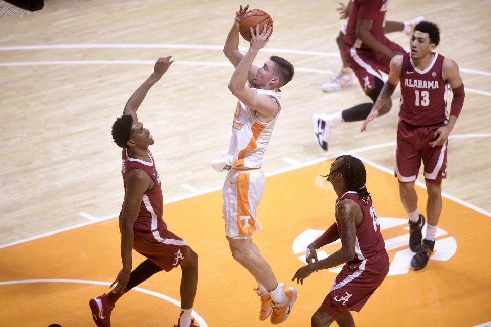 Tennessee forward John Fulkerson (10) shoots during an NCAA college basketball game against Alabama Saturday, Jan. 2, 2021, in Knoxville, Tenn. (Caitie McMekin/Knoxville News Sentinel via AP, Pool)