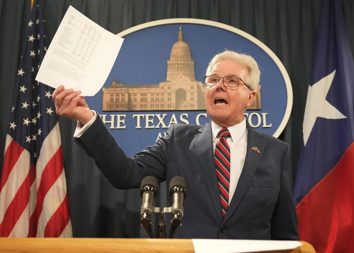 Lt. Gov. Dan Patrick holds a news conference Tuesday. The Texas Senate, which Patrick oversees, remains in session at the Capitol, although the House adjourned last week.