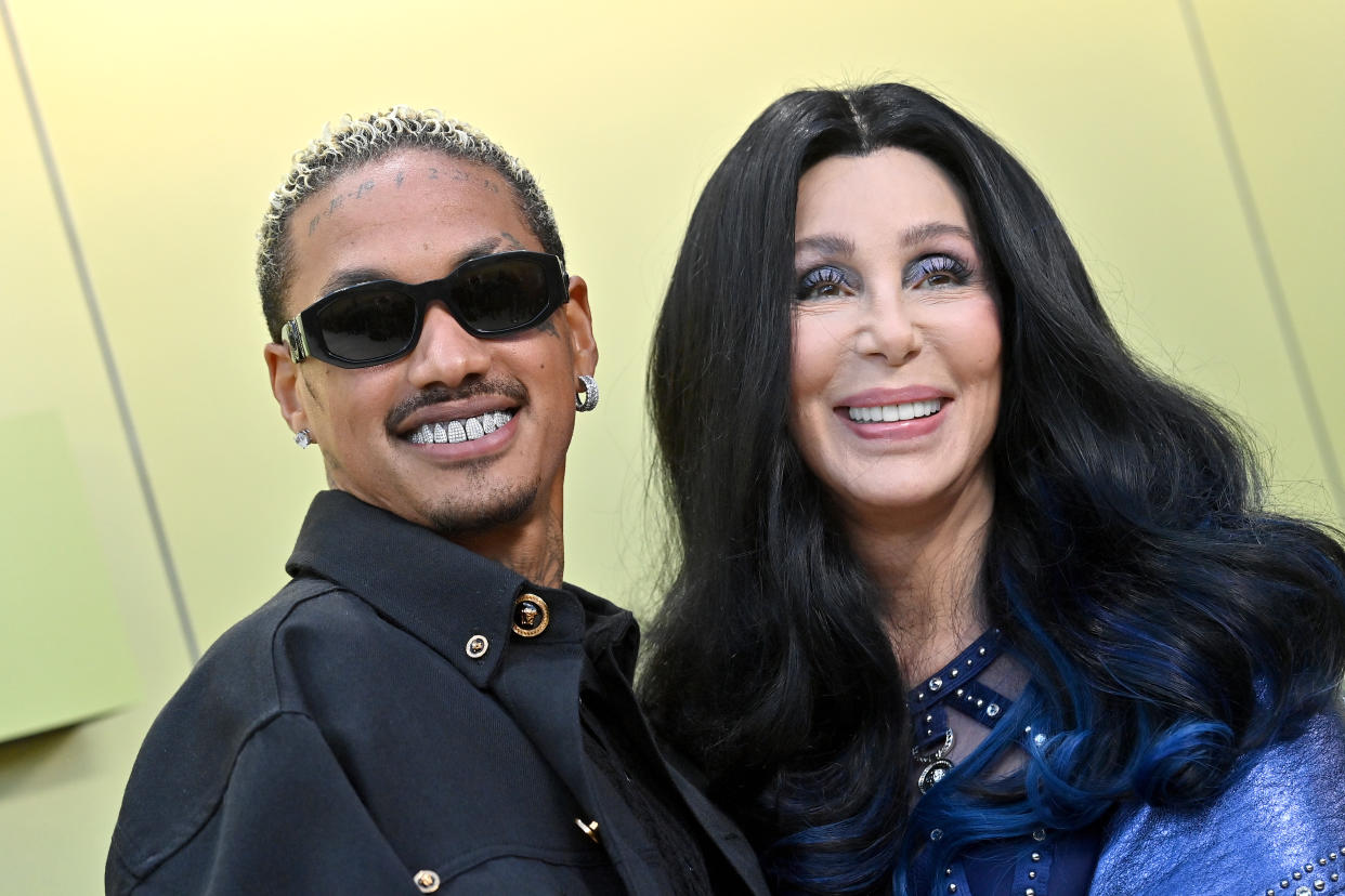 WEST HOLLYWOOD, CALIFORNIA - MARCH 09: Alexander Edwards and Cher attend the Versace FW23 Show at Pacific Design Center on March 09, 2023 in West Hollywood, California. (Photo by Axelle/Bauer-Griffin/FilmMagic)