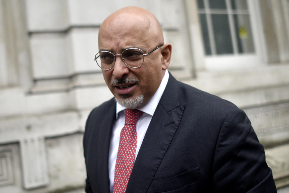 LONDON, ENGLAND - OCTOBER 21: A journalist attempts to interview Conservative MP Nadhim Zahawi as he leaves the cabinet office on October 21, 2019 in London, England. Prime Minister Boris Johnson is pressing Parliament for a "straight up-and-down vote" on his Brexit deal, after he was forced to ask the European Union for a new delay of the Brexit deadline. (Photo by Peter Summers/Getty Images)