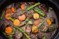 <p>Add some freshness to the beefy classic with this insanely delish slow cooker dinner.</p><p>Get the <a href="https://www.delish.com/uk/cooking/recipes/a28830287/slow-cooker-beef-bourguignon/" rel="nofollow noopener" target="_blank" data-ylk="slk:Slow Cooker Spring Beef Bourguignon;elm:context_link;itc:0;sec:content-canvas" class="link ">Slow Cooker Spring Beef Bourguignon</a> recipe.</p>