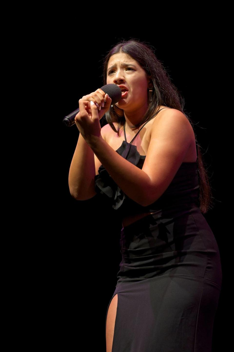 Luna Meneses, 17, of Doral Academy Preparatory High School, sings on the Actors’ Playhouse stage at the Miracle Theatre in Coral Gables during Young Talent Big Dreams’ finals competition on May 11, 2024. Luna won in her YTBD 2024 category of Individual Vocal in the pop, rock or rap field.