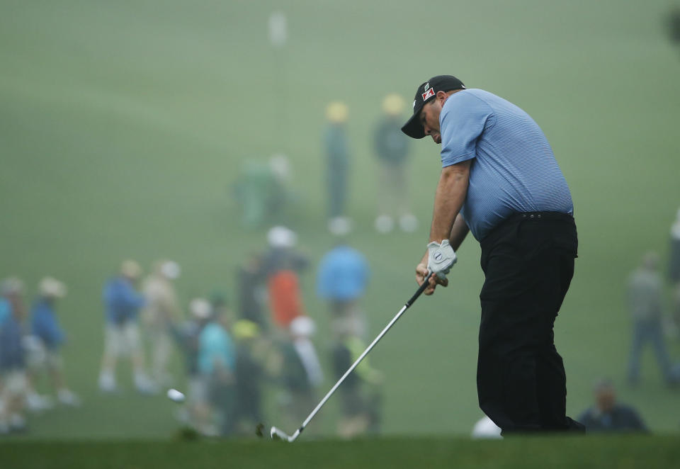 Kevin Stadler hits off the first fairway during a practice session for the Masters golf tournament Monday, April 7, 2014, in Augusta, Ga. (AP Photo/Matt Slocum)
