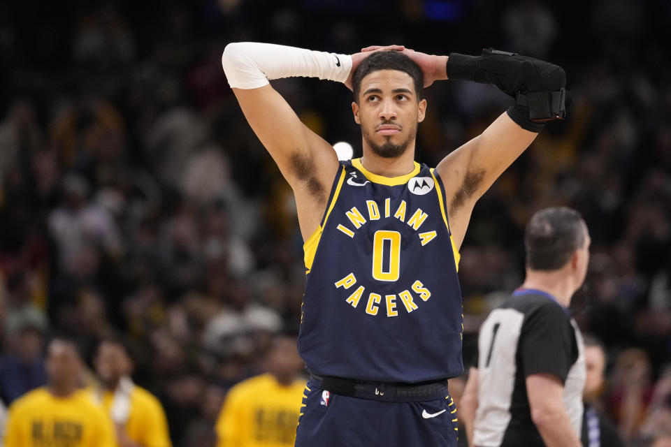 Indiana Pacers guard Tyrese Haliburton (0) reacts to a 112-11 loss to the Los Angeles Lakers in an NBA basketball game in Indianapolis, Thursday, Feb. 2, 2023. The Lakers defeated the Pacers 112-111. (AP Photo/Michael Conroy)