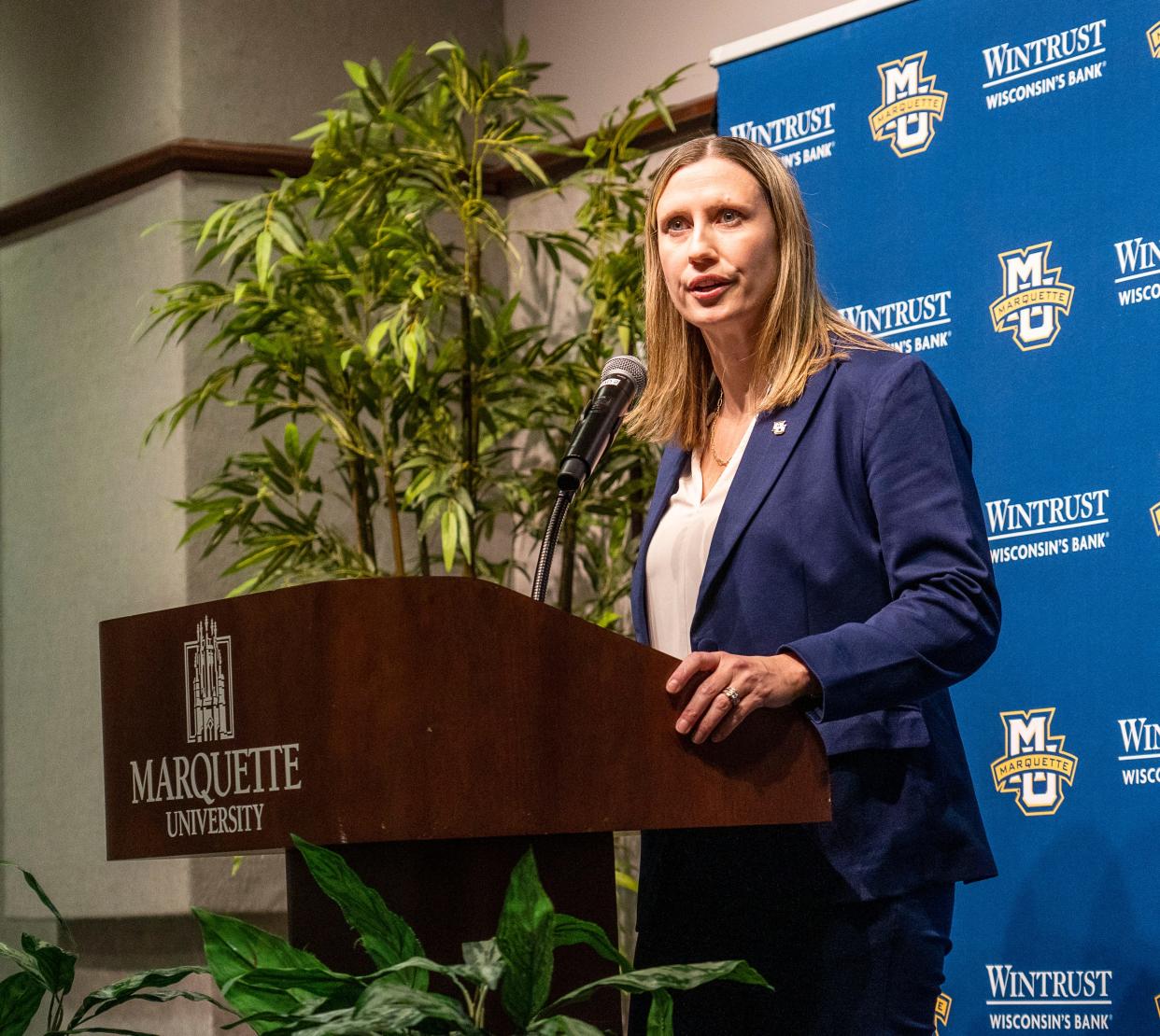 New Marquette women's basketball coach Cara Consuegra speaks during an introductory news conference Thursday.