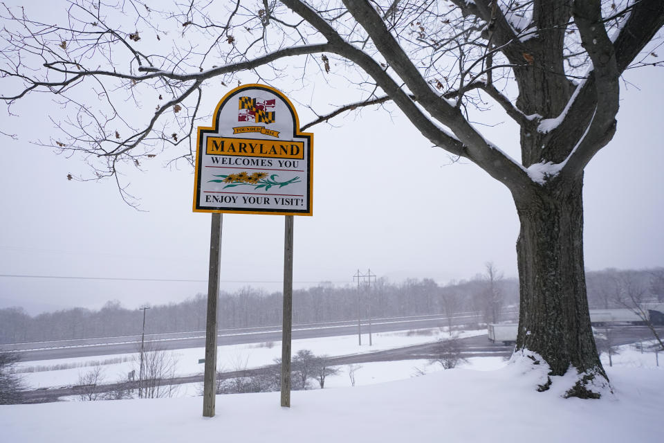 Snow covers the Youghiogheny Overlook Welcome Center along Interstate-68 near Maryland's west border with West Virginia, Friday, Jan. 28, 2022, in Friendsville, Md. A winter storm is moving into the Mid-Atlantic including blizzard warnings for Maryland's Eastern Shore. (AP Photo/Julio Cortez)