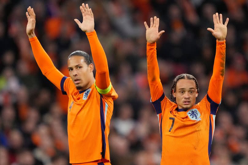 AMSTERDAM, NETHERLANDS - MARCH 22: (L-R) Virgil van Dijk of Holland, Xavi Simons of Holland  during the  International Friendly match between Holland  v Scotland at the Johan Cruijff Arena on March 22, 2024 in Amsterdam Netherlands