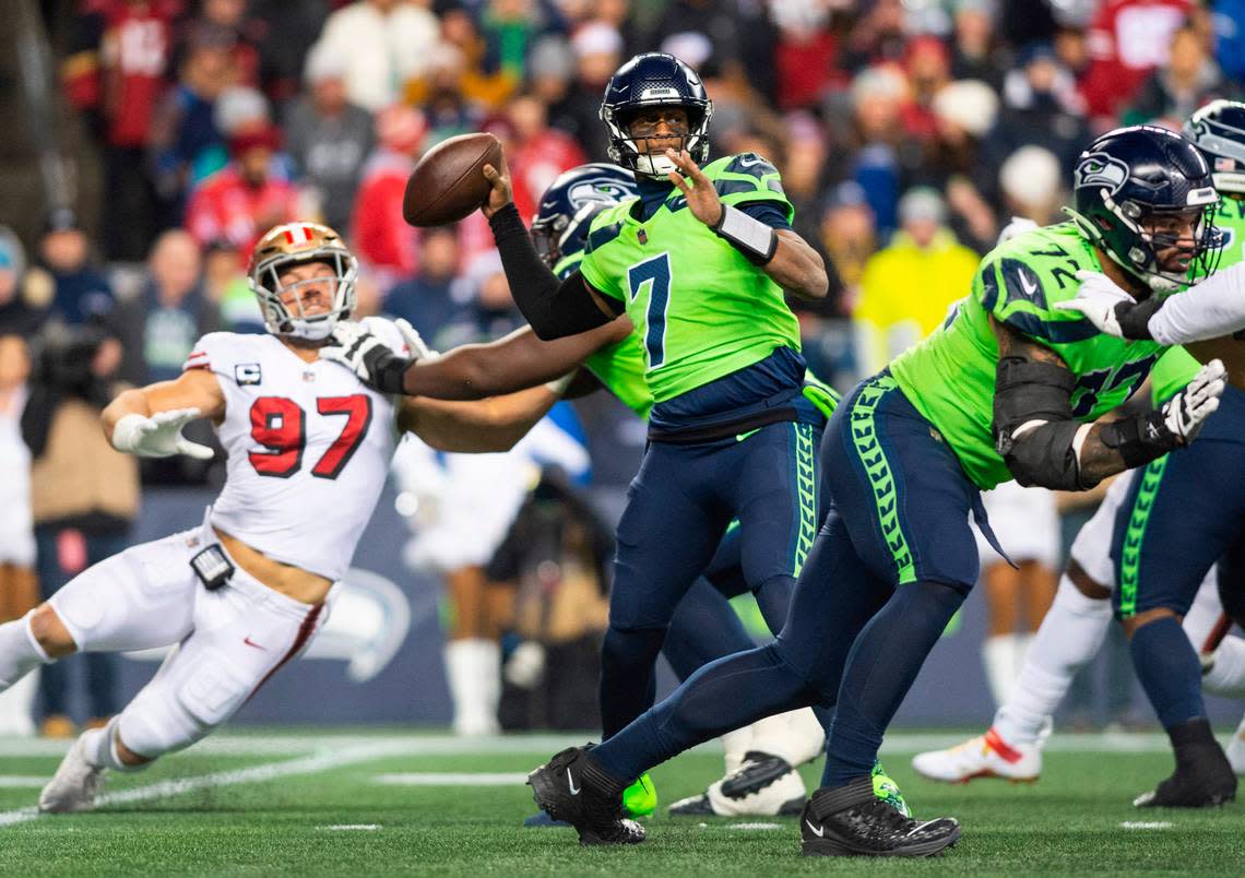 Seattle Seahawks quarterback Geno Smith (7) looks to pass the ball in the second quarter of an NFL game against the San Francisco 49ers at Lumen Field in Seattle Wash., on Dec. 15, 2022.