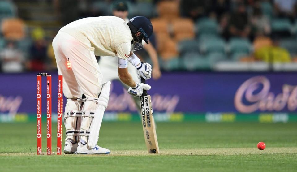 Joe Root is clean bowled by Australia’s Scott Boland (Darren England via AAP/PA) (PA Media)