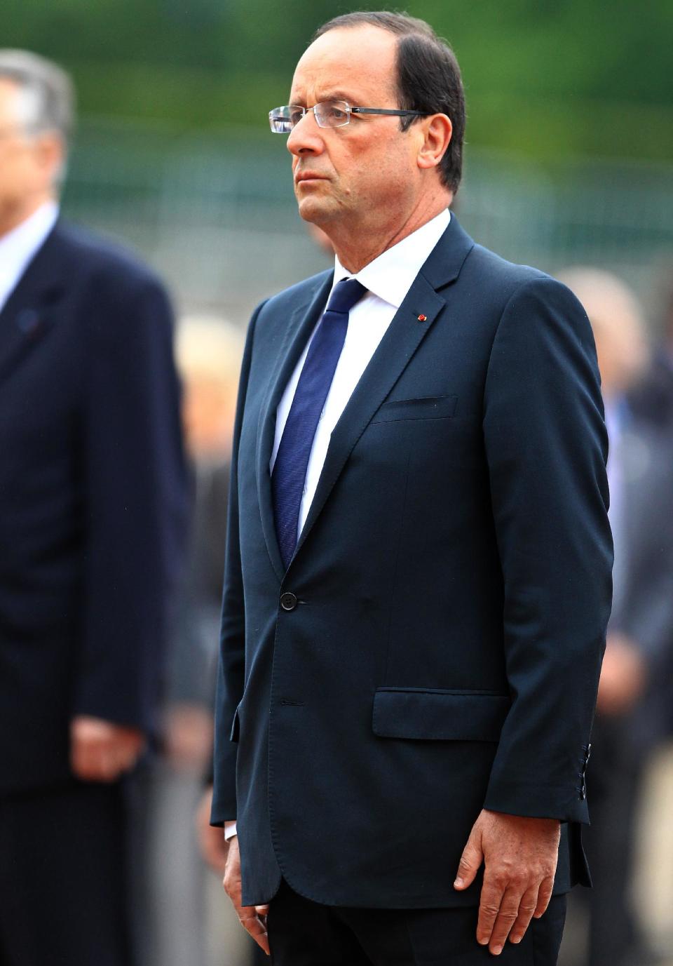 French President Francois Hollande attends a ceremony to mark the 72nd anniversary of Gen. Charles de Gaulle's appeal of June 18, 1940, at the Mont Valerien memorial in Suresnes, outside of Paris, Monday, June 18, 2012. The appeal, which was delivered on the BBC by Charles de Gaulle, served to rally his countrymen after the fall of France to Nazi Germany. (AP Photo/Bob Edme, Pool)