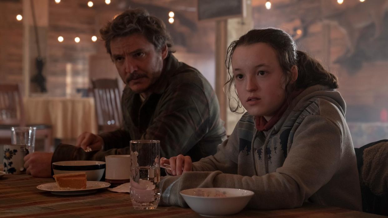  Pedro Pascal as Joel and Bella Ramsey as Ellie in The Last of Us 