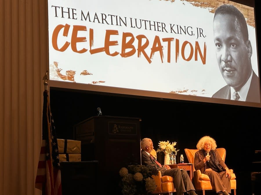 Angela Davis on the stage with Wornie Reed at the Randolph College MLK Jr. Celebration on Jan. 22. (Jemon Haskins/ WFXR News)