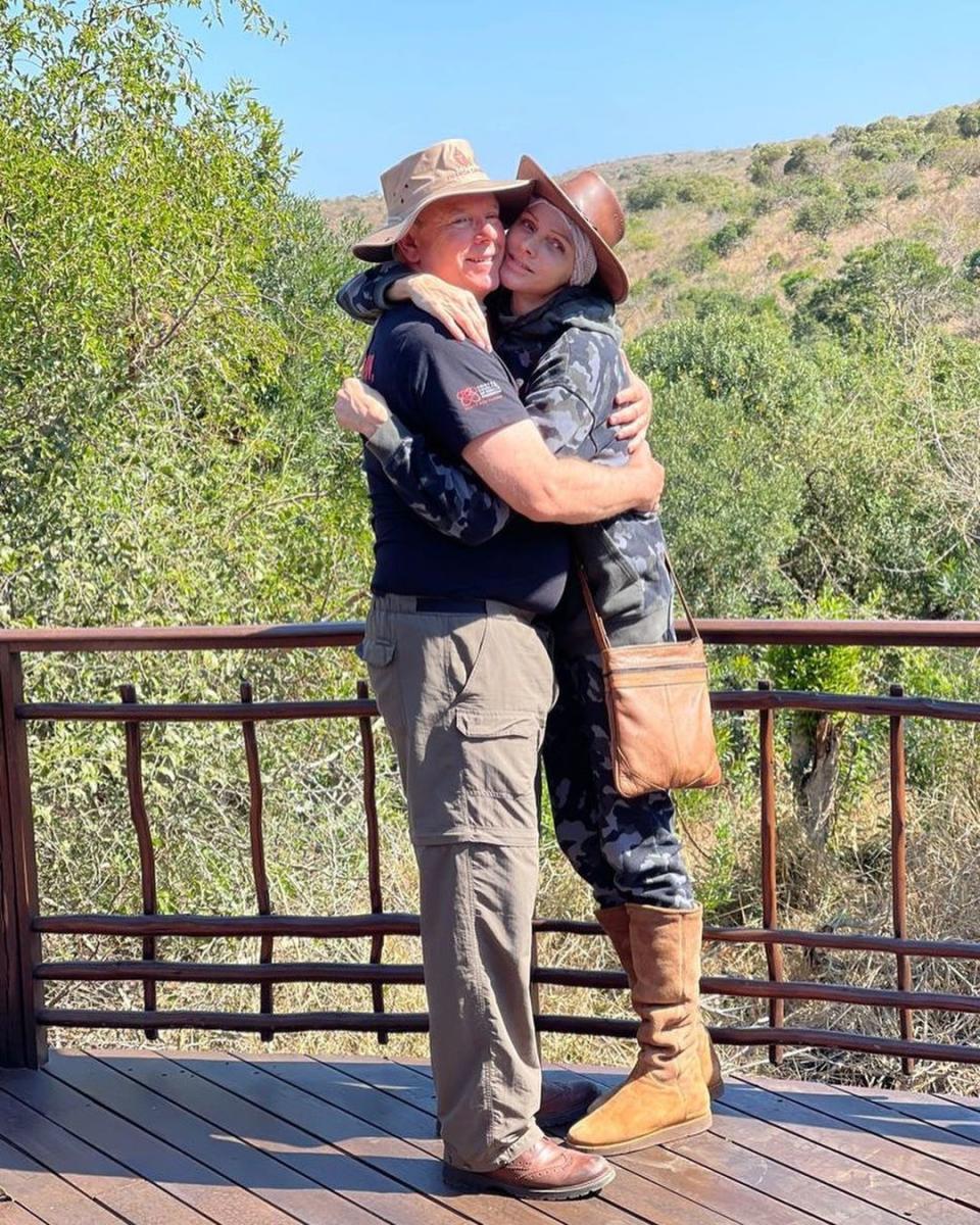 Prince Albert and Princess Charlene hug