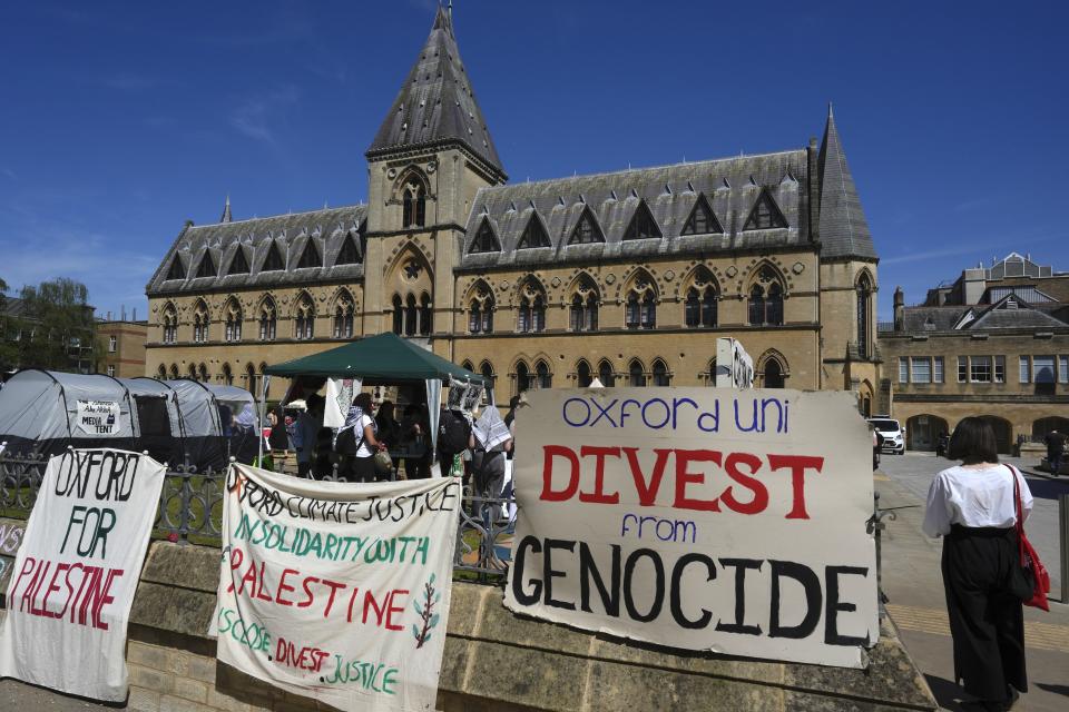 Pro-Palestinians camp outside the Pitt Rivers Museum at Oxford, in England, Thursday, May 9, 2024. Students in the UK, including in Leeds, Newcastle and Bristol, have set up tents outside university buildings, replicating the nationwide campus demonstrations which began in the US last month. (AP Photo/Kin Cheung)