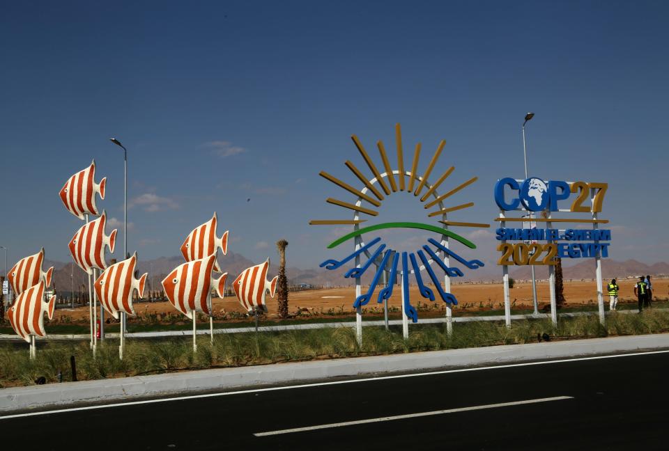 Signage promoting this year’s United Nations global summit on climate change, known as COP27, adorns Peace Road, in Sharm el-Sheikh, South Sinai, Egypt, Wednesday, Nov. 2, 2022.