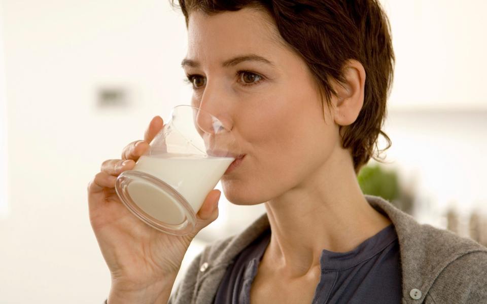 woman drinking milk - Getty 