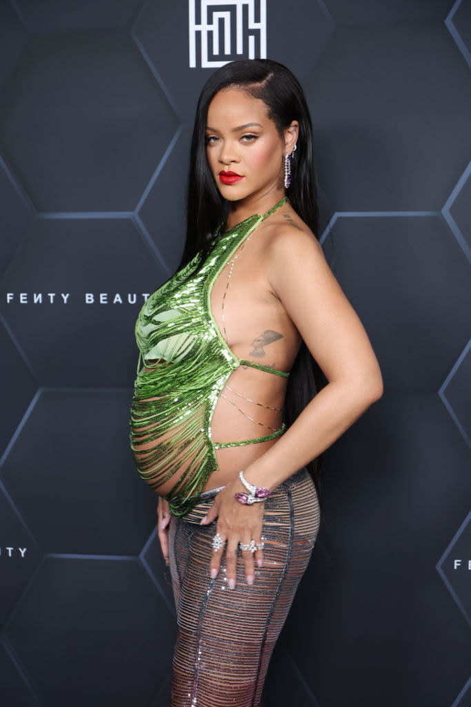 Rihanna poses for a picture as she celebrates her beauty brands Fenty beauty and Fenty skin