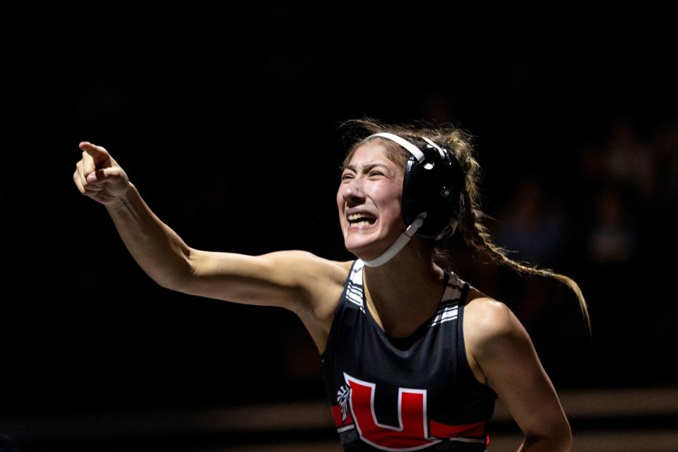 Unitah’s Kenna Mccauley celebrates a first place win during the 4A Girls Wrestling State Championships at the UCCU Center in Orem on Thursday, Feb. 15, 2024. | Marielle Scott, Deseret News