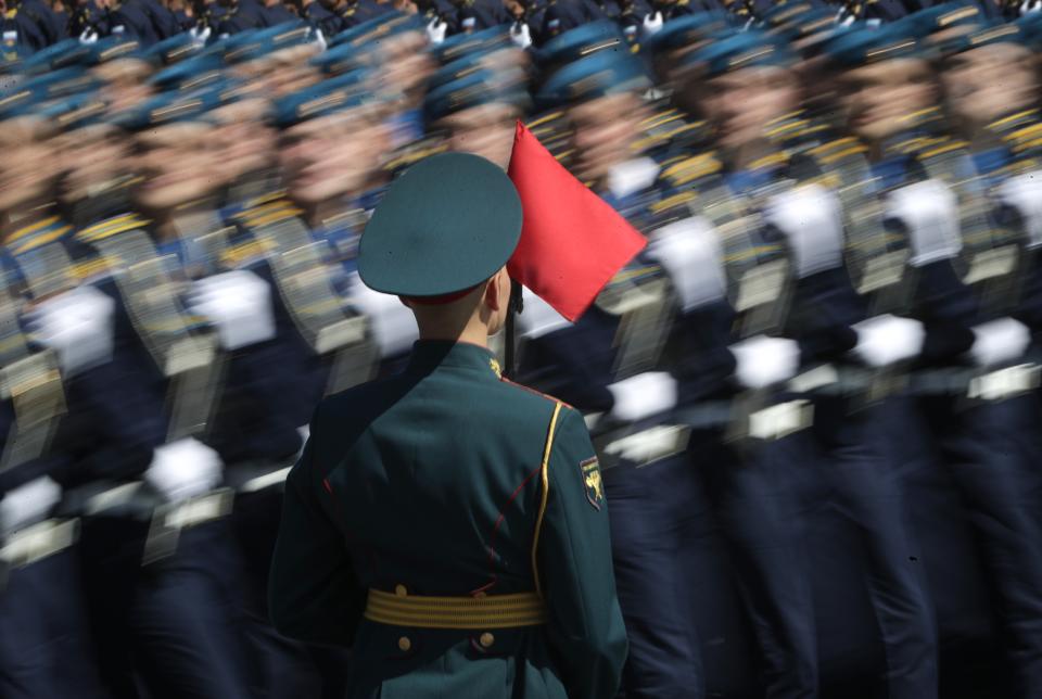 Russian soldiers march toward Red Square during the Victory Day military parade marking the 75th anniversary of the Nazi defeat in Moscow, Russia, Wednesday, June 24, 2020. The Victory Day parade normally is held on May 9, the nation's most important secular holiday, but this year it was postponed due to the coronavirus pandemic. (AP Photo/Pavel Golovkin, Pool)