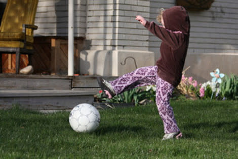 Addie used to kick the soccer ball in our yard for hours
